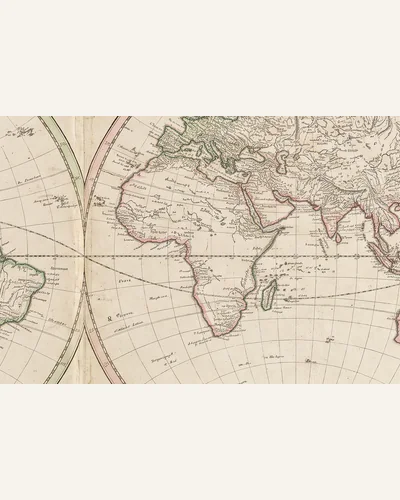 An engraved double-hemisphere world chart with later hand colour on aged laid paper. — the paper.