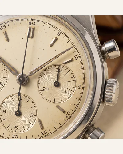 A silver-cased pocket chronometer with a subsidiary seconds dial.